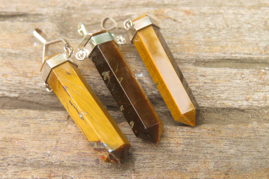 Golden Tigers Eye Crystal Point set in Sterling Silver Pendant